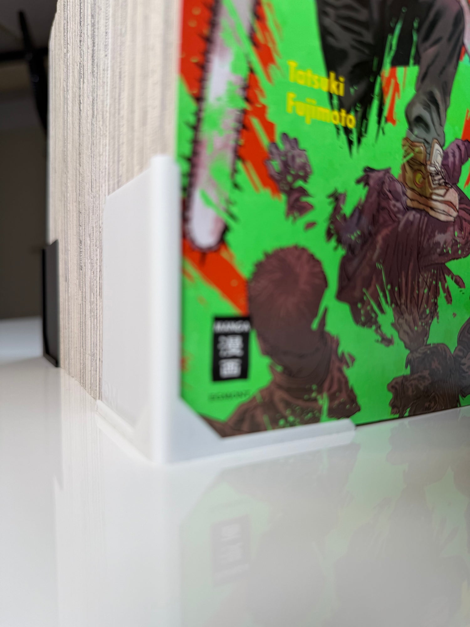 MG Phantom Bookend. Invisible Support for a Seamless Shelf.